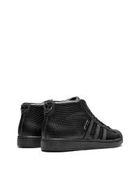 Baskets montantes en cuir imprimées serpent noires adidas