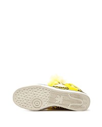 Baskets montantes en cuir jaunes adidas