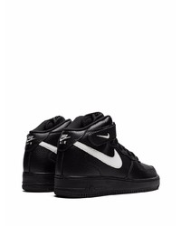 Baskets montantes en cuir noires et blanches Nike