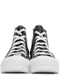 Baskets montantes en cuir noires et blanches Converse