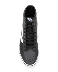 Baskets montantes en cuir noires et blanches Vans