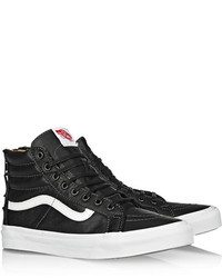 Baskets montantes en cuir noires et blanches Vans