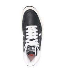 Baskets montantes en cuir noires et blanches Converse