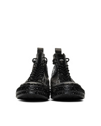 Baskets montantes en cuir noires Converse