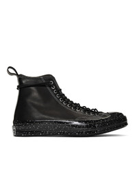 Baskets montantes en cuir noires Converse