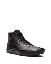 Baskets montantes en cuir noires Vans