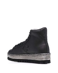 Baskets montantes en cuir noires Converse