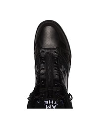 Baskets montantes en cuir noires Converse