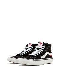 Baskets montantes en daim noires et blanches Vans