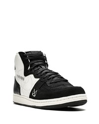 Baskets montantes en daim noires et blanches Nike