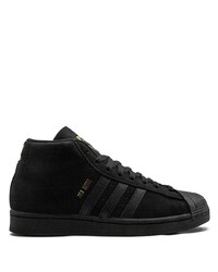 Baskets montantes en daim noires adidas