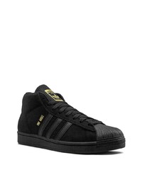 Baskets montantes en daim noires adidas