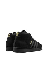 Baskets montantes en daim noires adidas