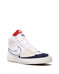 Baskets montantes en toile blanc et rouge et bleu marine Nike