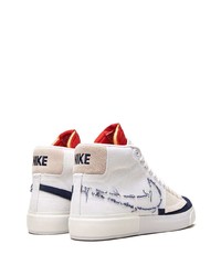 Baskets montantes en toile blanc et rouge et bleu marine Nike