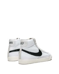 Baskets montantes en toile blanches et noires Nike