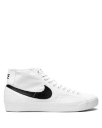 Baskets montantes en toile blanches et noires Nike