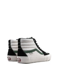 Baskets montantes en toile blanches et noires Vans