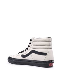 Baskets montantes en toile blanches et noires Vans