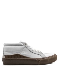 Baskets montantes en toile blanches Vans