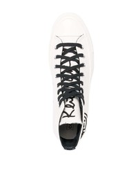 Baskets montantes en toile imprimées blanches et noires Converse