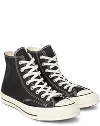 Baskets montantes en toile noires et blanches Converse