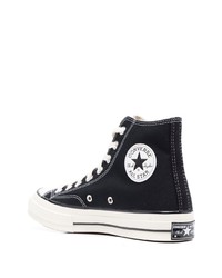 Baskets montantes en toile noires et blanches Converse