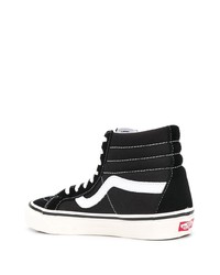 Baskets montantes en toile noires et blanches Vans