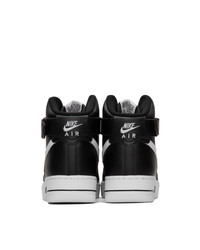 Baskets montantes en toile noires et blanches Nike