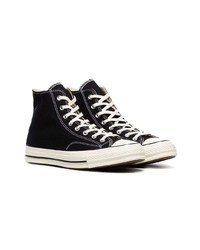 Baskets montantes en toile noires et blanches Converse