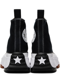 Baskets montantes en toile noires et blanches Converse