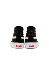 Baskets montantes en toile noires et blanches Vans