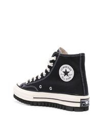 Baskets montantes en toile noires et blanches Converse