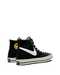 Baskets montantes en toile noires et blanches Converse