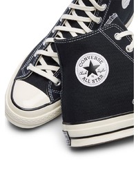 Baskets montantes en toile noires et blanches Converse