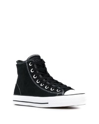 Baskets montantes en toile noires et blanches Converse