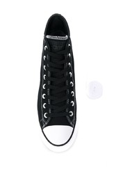 Baskets montantes en toile noires et blanches Converse