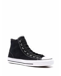 Baskets montantes en toile noires et blanches Converse