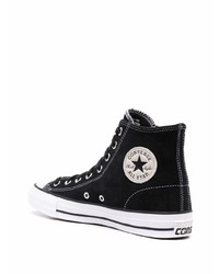 Baskets montantes en toile noires et blanches Converse