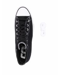 Baskets montantes en toile noires et blanches Converse