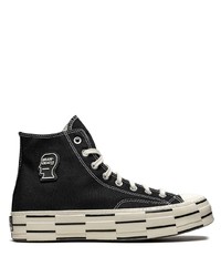 Baskets montantes en toile noires et blanches Converse