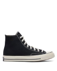 Baskets montantes en toile noires et blanches Converse