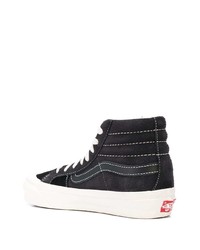 Baskets montantes en toile noires et blanches Vans