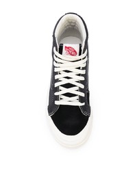 Baskets montantes en toile noires et blanches Vans