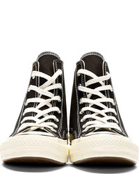 Baskets montantes en toile noires et blanches Converse