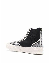 Baskets montantes en toile noires et blanches Converse