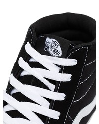 Baskets montantes en toile noires et blanches Vans