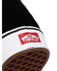 Baskets montantes en toile noires et blanches Vans