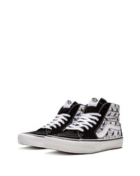 Baskets montantes en toile noires et blanches Vans