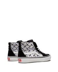 Baskets montantes en toile noires et blanches Vans